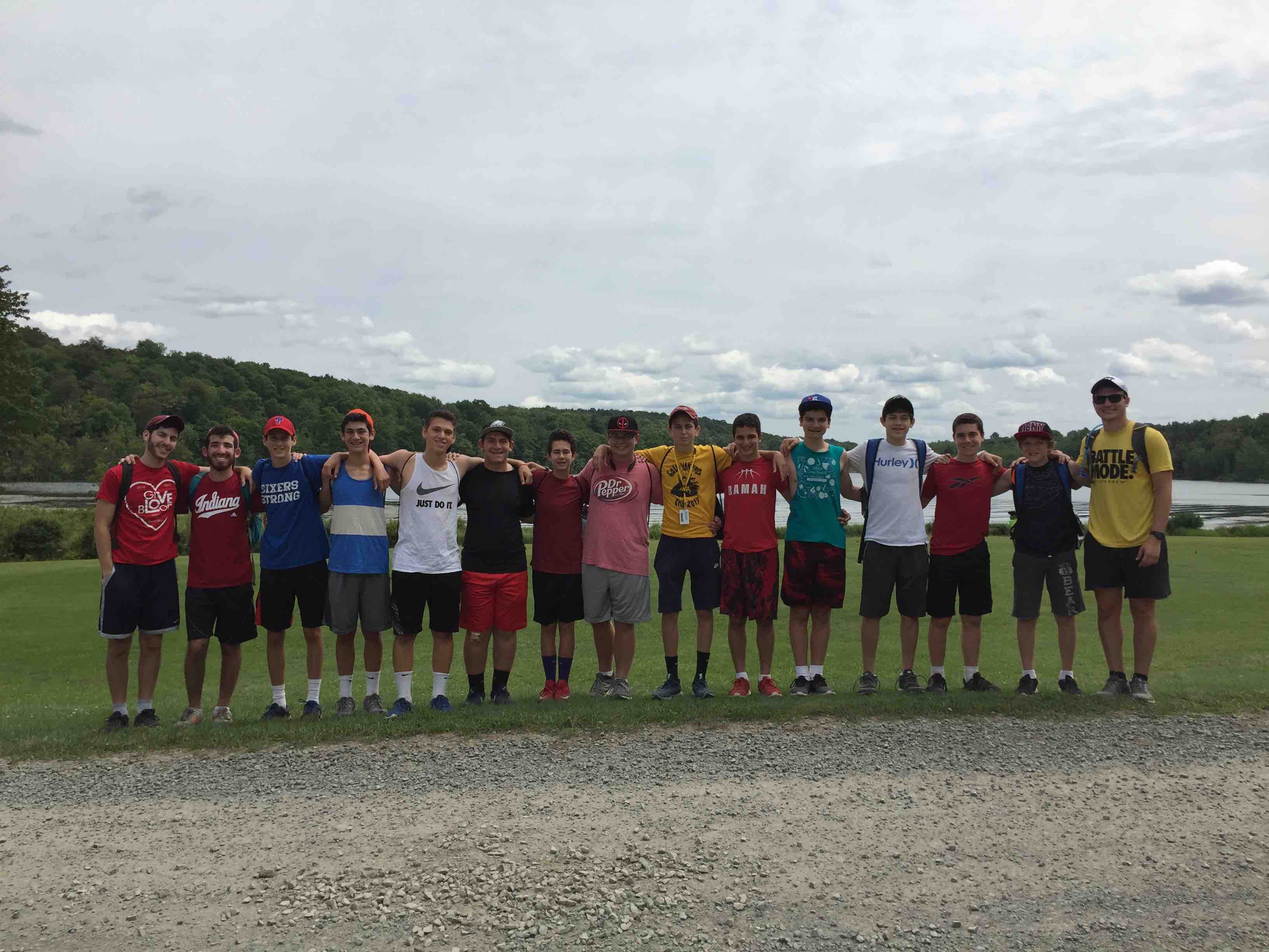 A group of boys with their arms around each other