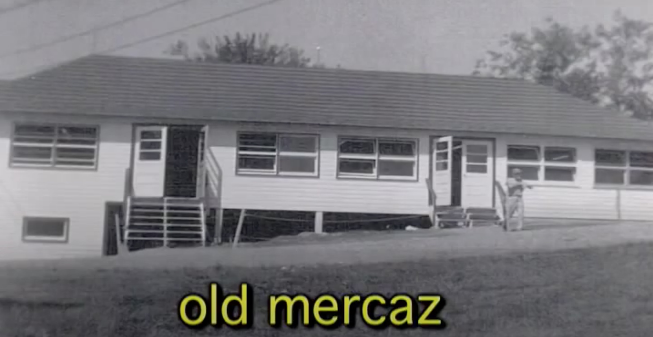 A photograph of the same building at Camp Ramah labelled "old mercaz"
