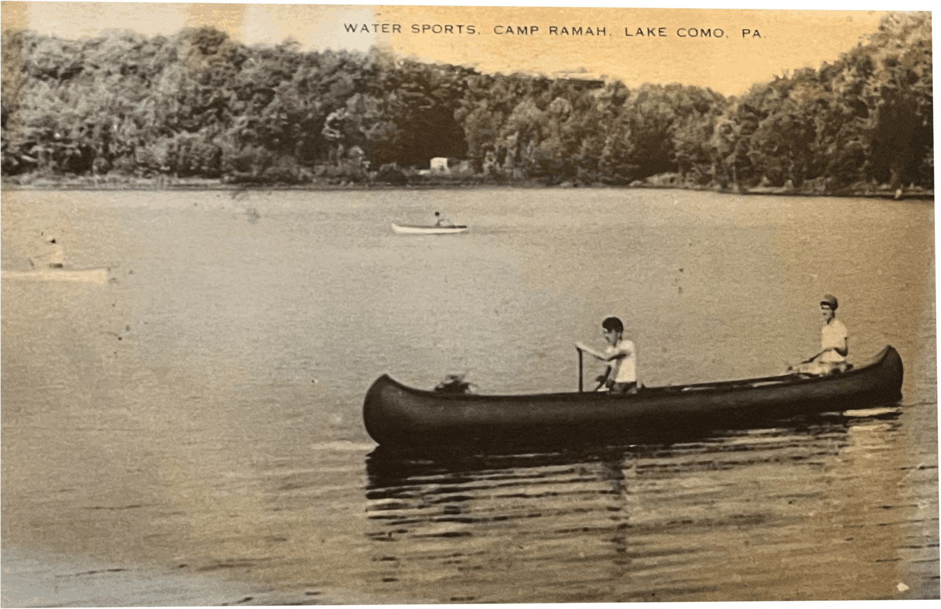 A postcard with a photograph of a group of people canoeing on a lake and the title "Water Sports, Camp Ramah, Lake Como, PA"